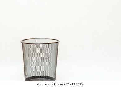 Empty Mesh Trash Bin, Garbage Can On A White Background.