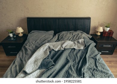 Empty Messy Bed With Grey Sheets Copy Space