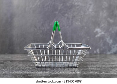 Empty Metal Shopping Cart In A Supermarket, Side View