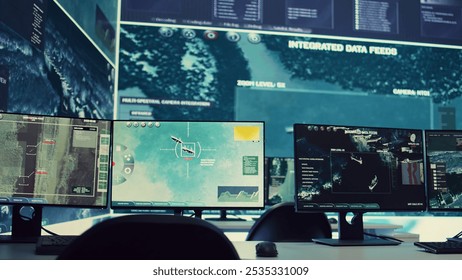 Empty military operation room headquarters with a big screen and desks used for reconnaissance and national safety missions, oversight on a world map. Army intelligence gear and CCTV footage. - Powered by Shutterstock