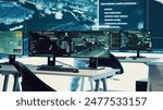 Empty military secret service headquarters used to follow threats or national safety alerts, high tech equipment for a federal agency. Army command center with a big screen, telecommunications.