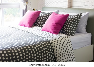 Empty modern bed in bedroom