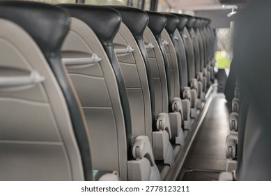 Empty Modern Bus Interior With Rows of Passenger Seats, Public Transport Background With Copy Space