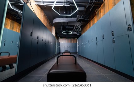 Empty Modern Dark Gym Locker Room. Stylish Indoor Fitness Club Locker Room.