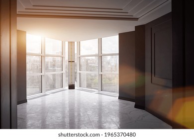 Empty Modern Flat In Construction. Large Windows, Black Walls And A Bright Sun Shining Through The Window. No People