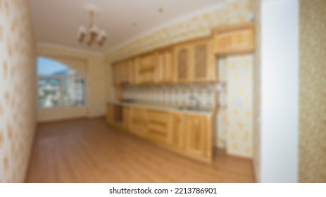 Empty Modern Kitchen Dining Room With Pantry Interior Design. Defocused And Blured Bright Empty Kitchen Without Furniture For Show, Promote And Design Content Or Product On Display Concept