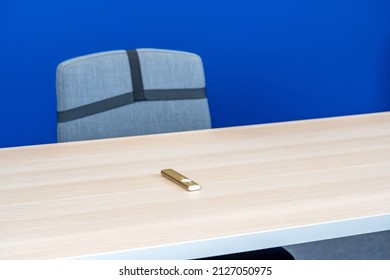 Empty Modern Studio Conference Room Table, Chair And A Presentation Remote Control, Blue Screen. Lecture Hall, Course, Talk Or Seminar, Live Stream Broadcast Abstract Concept, Nobody, No People