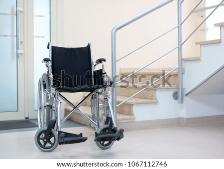 Similar – Senior woman in a wheelchair alone