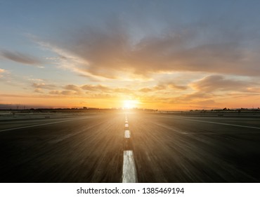 Empty motorway with sunset. Outdoor photography. Travel and sport, speed and freedom concept