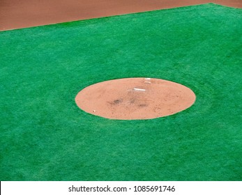 Empty Pitcher’s Mound Of A Baseball Diamond Awaiting Pitcher