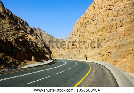 Empty mountain road through the dessert mountain on Jabal Jais in UAE