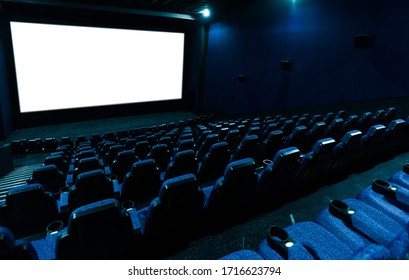 Empty Movie Theatre Interior With Screen And Seats.