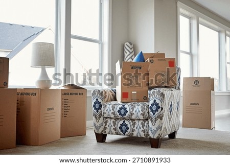 Empty, moving and boxes on sofa in home for relocation, property investment or real estate. Interior, furniture and cardboard in living room for mortgage, rent or unpacking in new apartment or house.