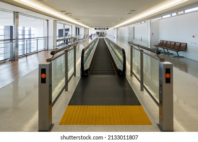 Empty Moving Sidewalk In Vacant Airport Terminal 