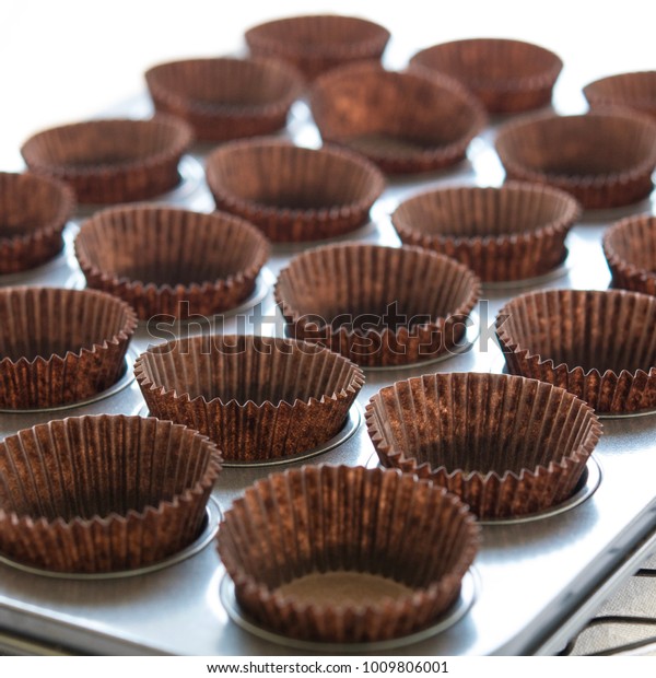 Empty Muffin Papers Ready Baking Cupcakes Stock Photo Edit Now 1009806001 empty-muffin-papers-ready-baking-cupcakes-stock-photo-edit-now-1009806001