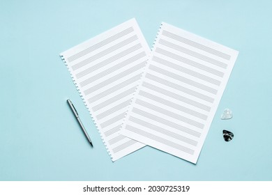 Empty music sheets for writing notes, top view. Compose music concept