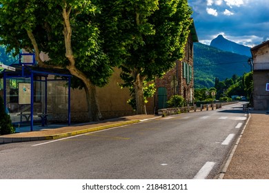 An Empty Narrow Road And A Bus Stop In Touët-sur-Var, A French Village In Alpes-Maritimes