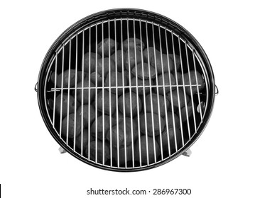 Empty New Clean BBQ Kettle Grill With Charcoal Briquettes In The Pit Isolated On White Background Overhead View