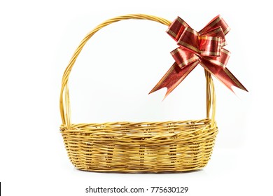 Empty New Year Basket Gift With Red-gold Ribbon Bow On Copy Space Background Isolated On White