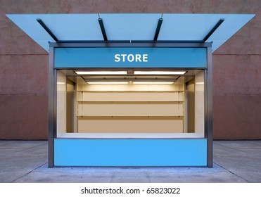 empty news stall on street of city at night time - Powered by Shutterstock