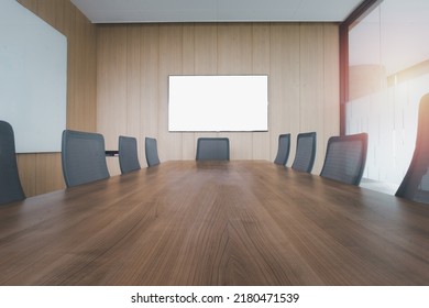 Empty No People Meeting Room In Office. Office Chair And Wooden Table.  