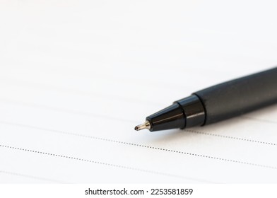 Empty note and black pen with copy spcae for texiting, education take note and lecture.