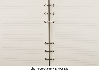 empty notebook with metal ring texture