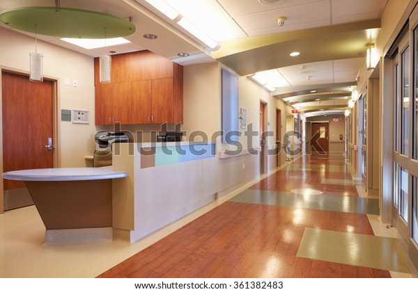 Empty\
Nurses Station And Corridor In Modern\
Hospital