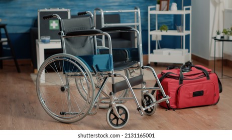 Empty Nursing Home Room With Wheelchair And Medical Equipment For Retired And Disabled People. Nobody In Space With Bag And Transportation Object For Healthcare And Wellness At Facility.