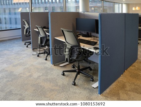 Empty office chairs in a row