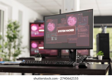 Empty office interior shows multiple monitors with hacked system warnings and security alerts. Technology concept illustrates cybercrime, compromised networks, and digital interface vulnerability.
