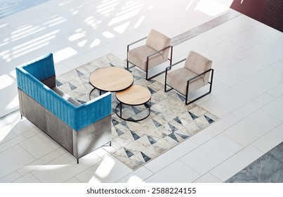 Empty office, lobby and table by chairs, above or corporate lounge with carpet at company. Furniture, interior design and decor with rug in reception, workplace or waiting room at insurance agency