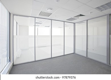 Empty Office Room With Glass Walls And Doors