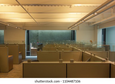 An Empty Office Space With Furnished Cubicles. 