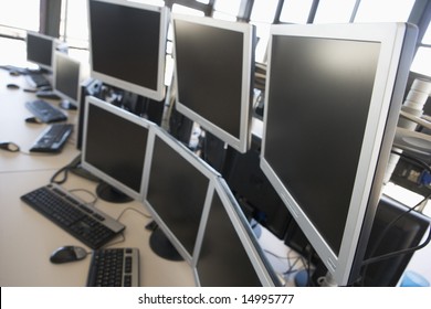 Empty Office Space With Many Monitors