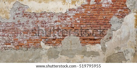 Empty Old Brick Wall Texture. Painted Distressed Wall Surface. Grungy Wide Brickwall. Grunge Red Stonewall Background. Shabby Building Facade With Damaged Plaster.  Abstract Web Banner. Copy Space. ストックフォト © 