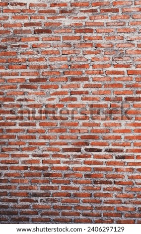 Empty old red brick wall made with blocks for abstract background and texture. beautiful patterns, space for work, close up, Vertical.
