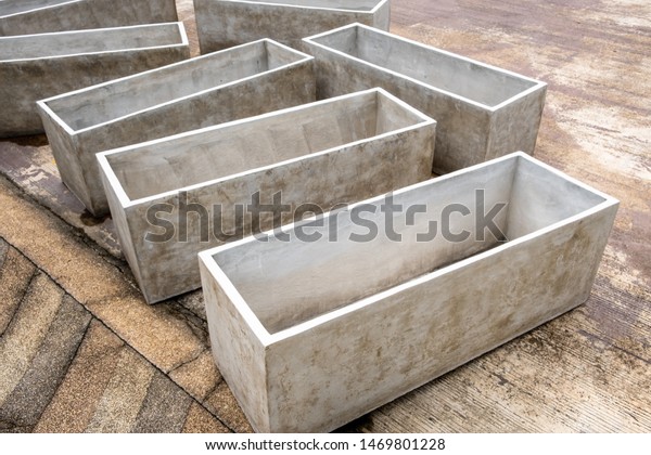 Empty Old Stained Concrete Rectangular Pots Royalty Free Stock Image