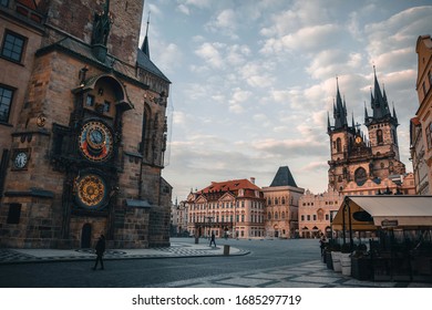 Empty Old town square in Prague with Orloj and Tyn temple during the Coronavirus epidemic. Sunset. Pandemic. Quarantine. Prague, Czech Republic. 