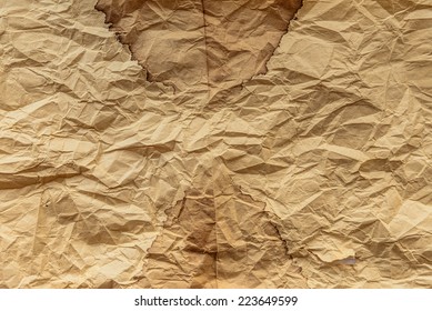 Empty old yellow crumpled paper background, space for text - Shutterstock ID 223649599