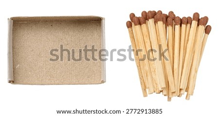 An empty open brown cardboard box and a scattering of new wooden matches with brown sulfur heads on an isolated background.