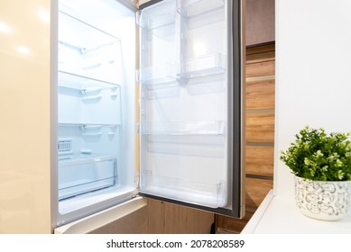 Empty Open Fridge, Refrigerator In Modern Home