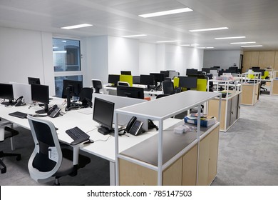 Empty open plan office with multiple work stations