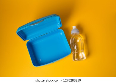 Empty Open Plastic Lunch Box And Bottle Of Water, Food Container For School, Top View