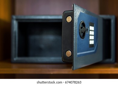 Empty Open Safe In Hotel Room Or Home. Safety Box Or Modern Electronic Locker, Close-up View Of Mechanism Of Small Safe, Strongbox. Focus On Safe Lock.