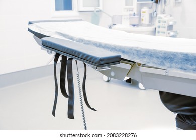 Empty Operating Room In A Hospital. Surgical Equipment With Operating Table. Medical Device For Emergency Patient In Blue Tone Style. Blank Emergency Surgery Room. Clinic Interior For Background.