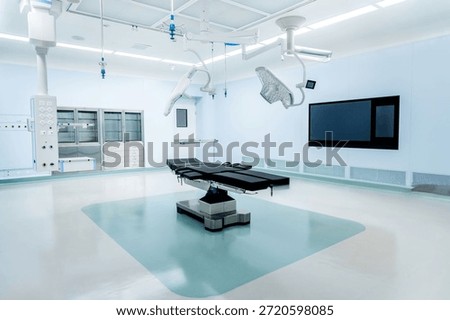 Empty operating room with operating table