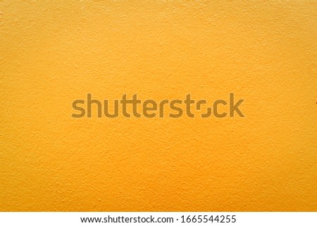 Empty orange cement wall background and texture. Beautiful Orange Advertising Backdrop.