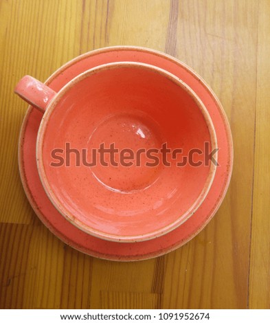 Empty orange cup