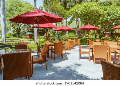 Empty Outdoor Patio Table And Chair With Umbrella